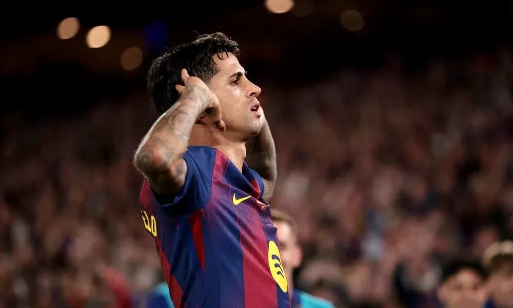 Player celebrating in front of cheering crowd Player celebrating in front of cheering crowd