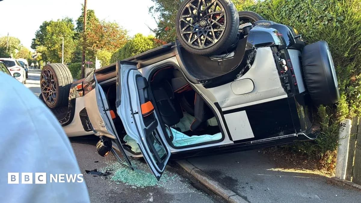 Upside-down car on roadside with broken glass Upside-down car on roadside with broken glass