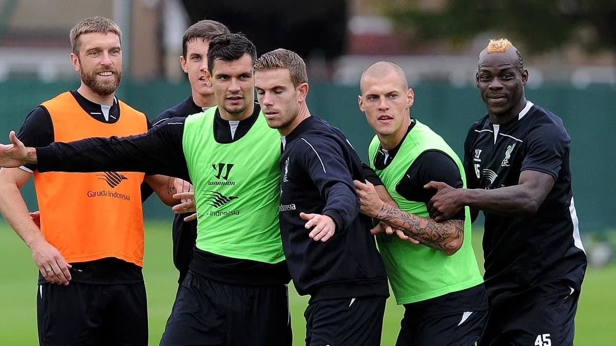Liverpool players training in team jerseys and vests Liverpool players training in team jerseys and vests
