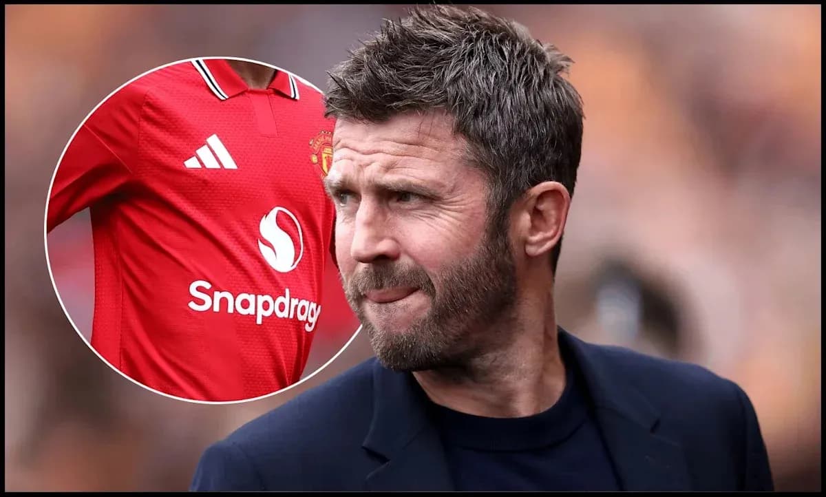 Coach observing match with Manchester United jersey shown Coach observing match with Manchester United jersey shown