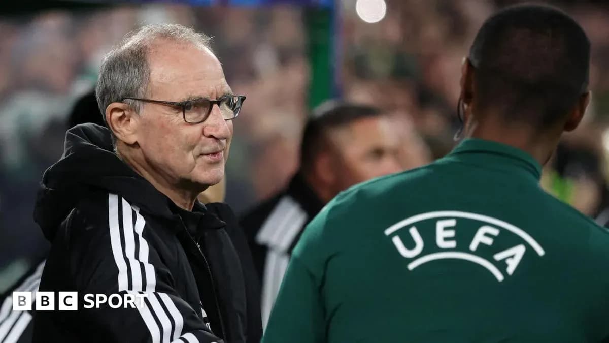 Manager speaking with UEFA official during match Manager speaking with UEFA official during match