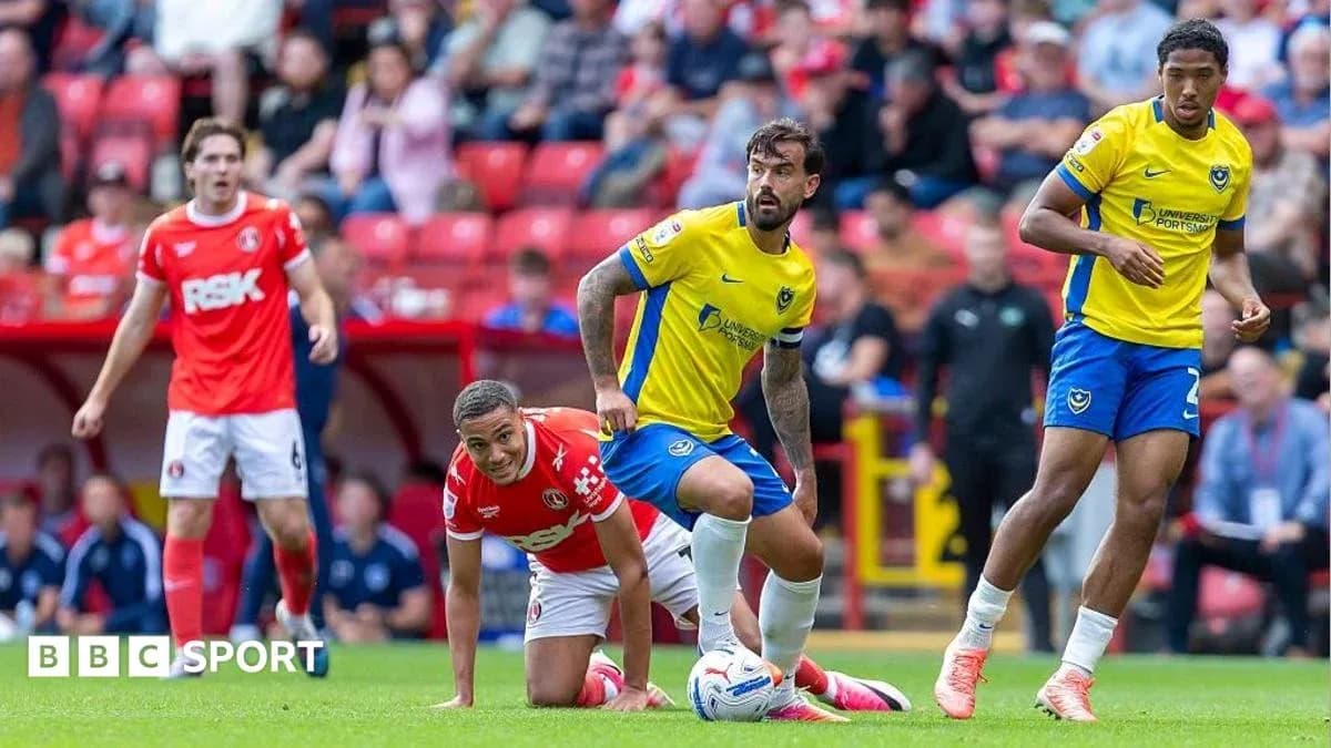 Players from Portsmouth and Charlton Athletic during match Players from Portsmouth and Charlton Athletic during match