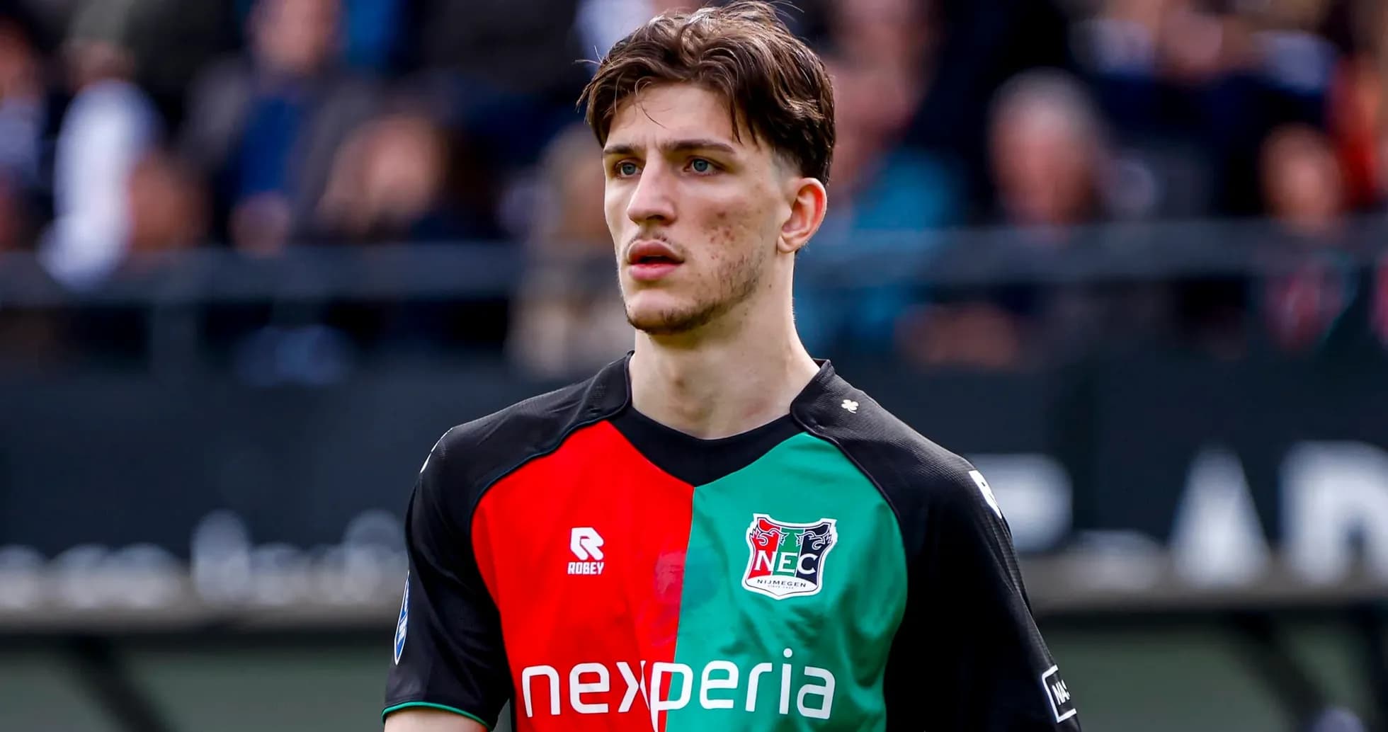Player in NEC Nijmegen jersey on the field Player in NEC Nijmegen jersey on the field