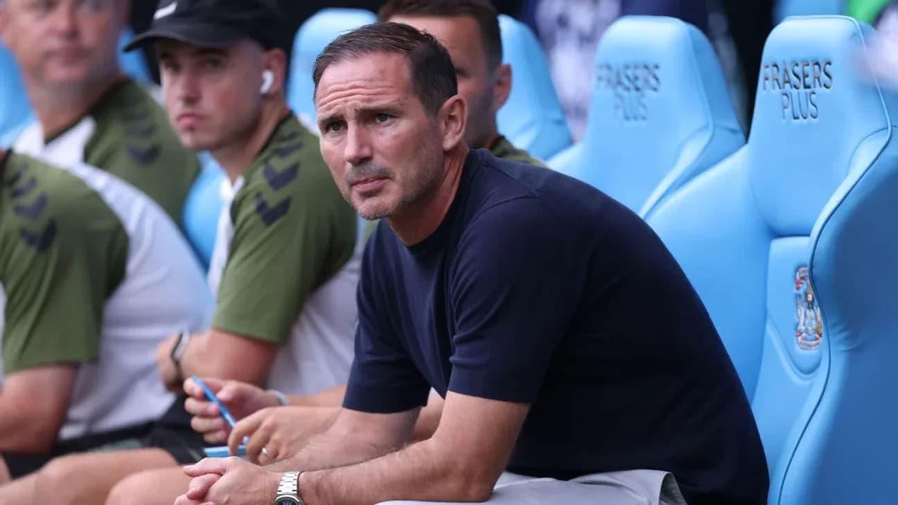 Manager sitting on bench during a match Manager sitting on bench during a match