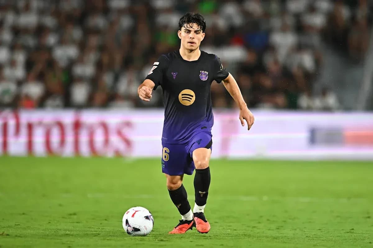 Player dribbling the ball on the field Player dribbling the ball on the field
