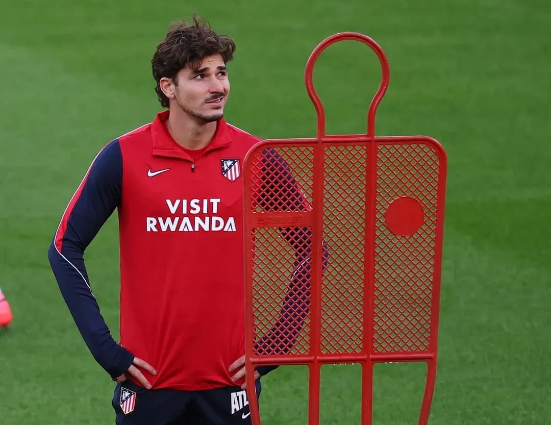 Player in training session near training dummy Player in training session near training dummy