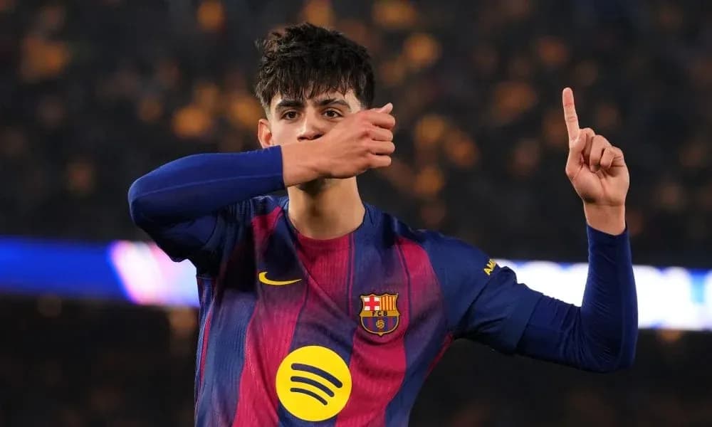Player celebrating after scoring a goal for Barcelona Player celebrating after scoring a goal for Barcelona
