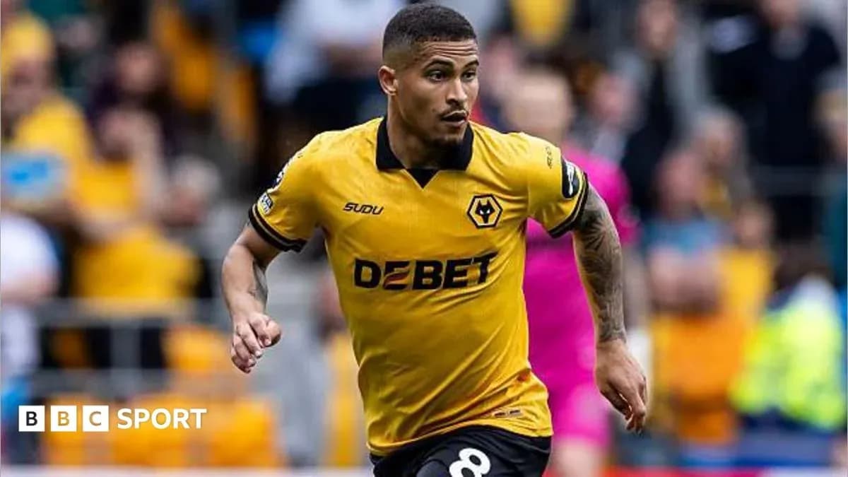 Wolverhampton Wanderers player running during match Wolverhampton Wanderers player running during match