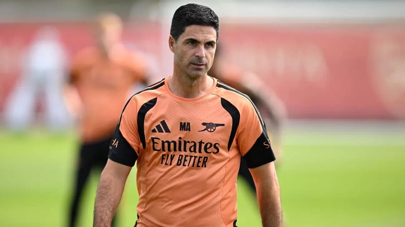 Coach in training kit at Arsenal training session Coach in training kit at Arsenal training session