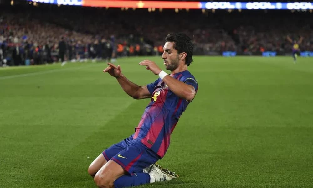 Barcelona player celebrating a goal on the pitch Barcelona player celebrating a goal on the pitch