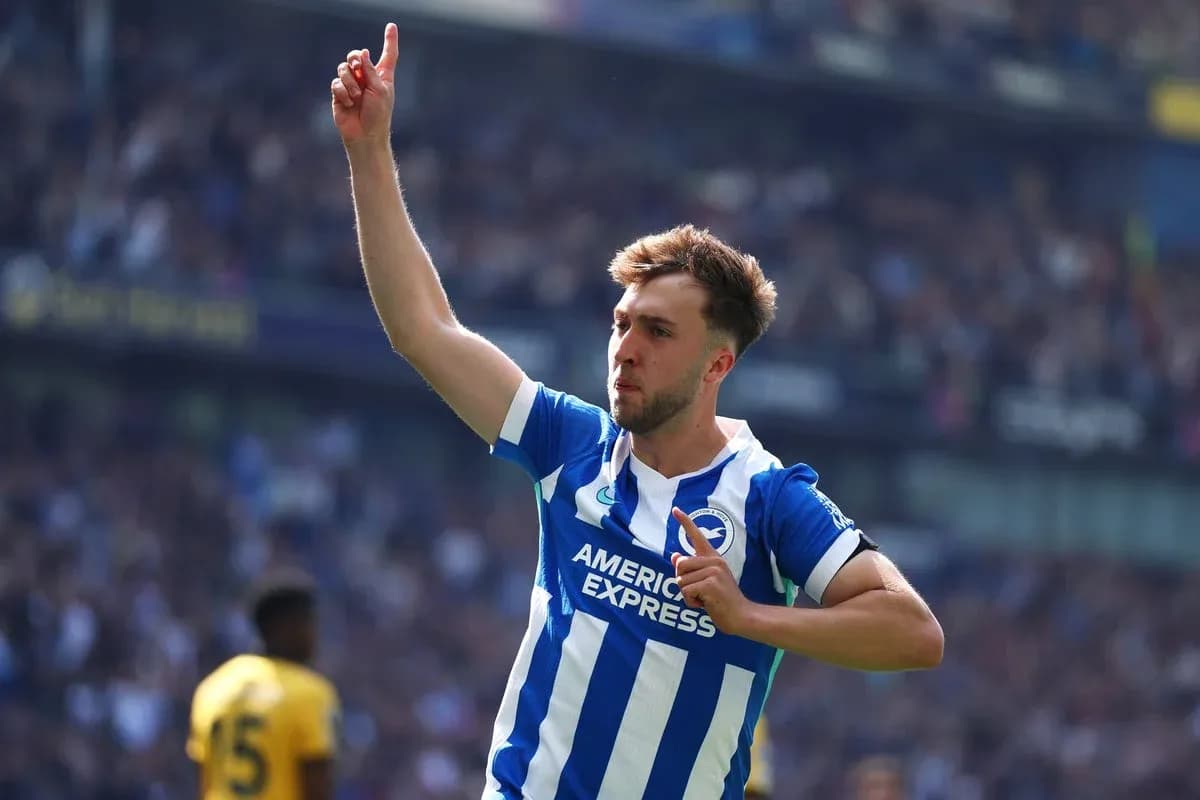 Player celebrating goal with raised finger at stadium Player celebrating goal with raised finger at stadium