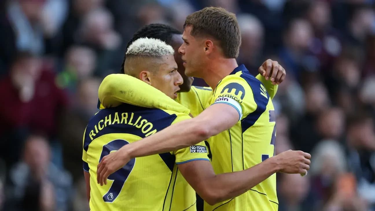 Tottenham players celebrating a goal together Tottenham players celebrating a goal together