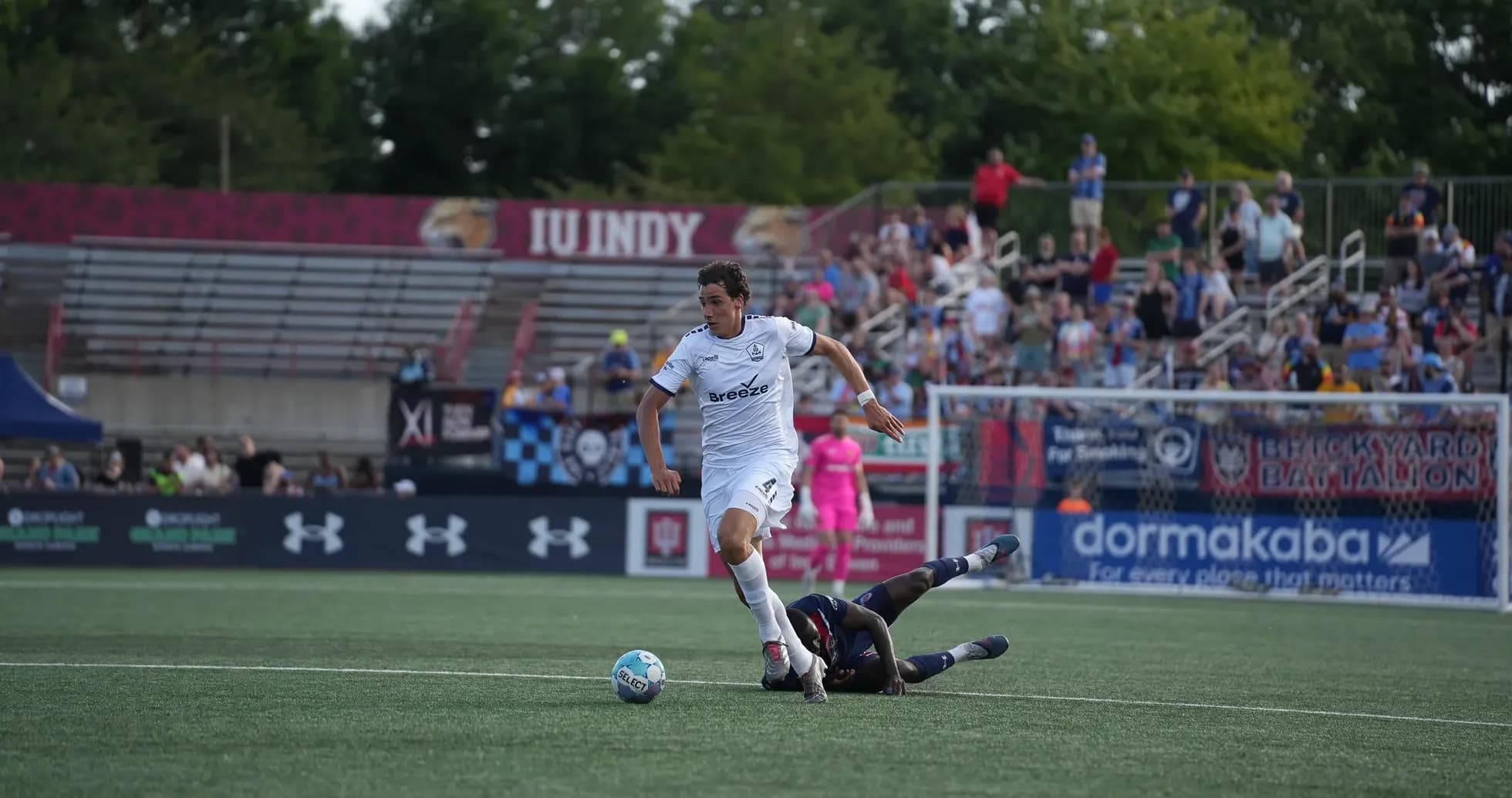 Player dribbling during Rhode Island vs Westchester SC match Player dribbling during Rhode Island vs Westchester SC match