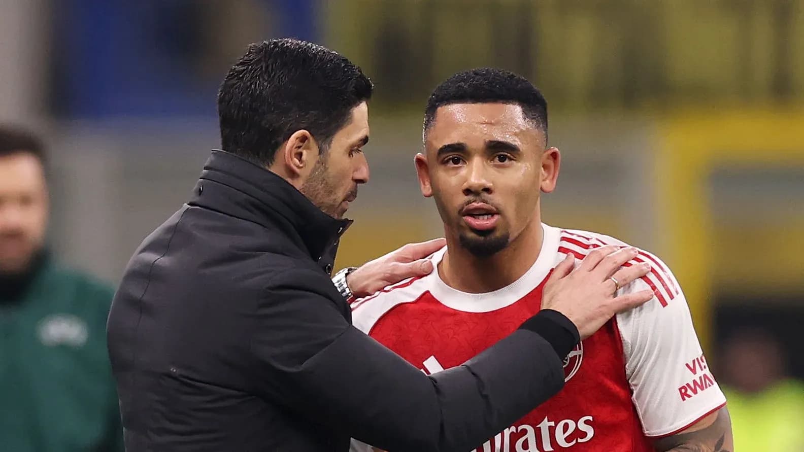 Manager discussing with player during match substitution Manager discussing with player during match substitution