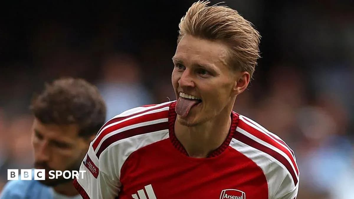 Arsenal player celebrating with tongue out Arsenal player celebrating with tongue out