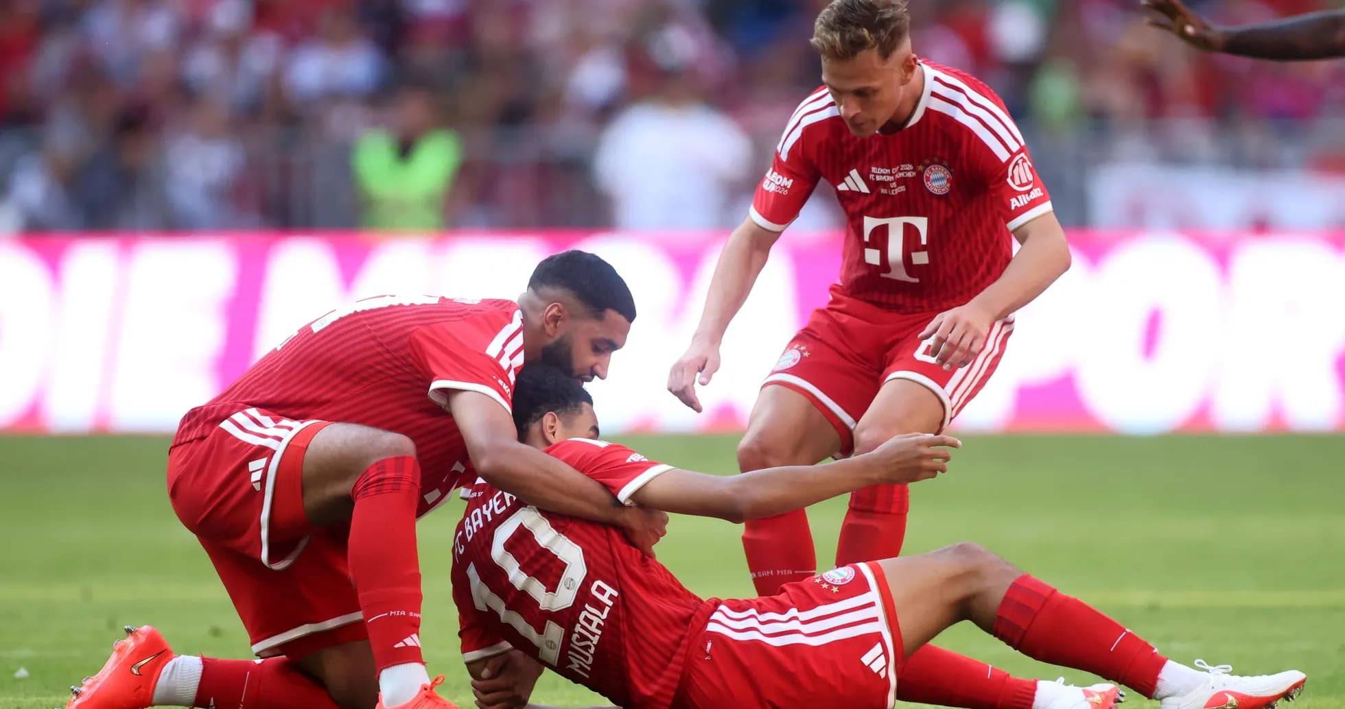 Bayern Munich players celebrating after scoring a goal Bayern Munich players celebrating after scoring a goal