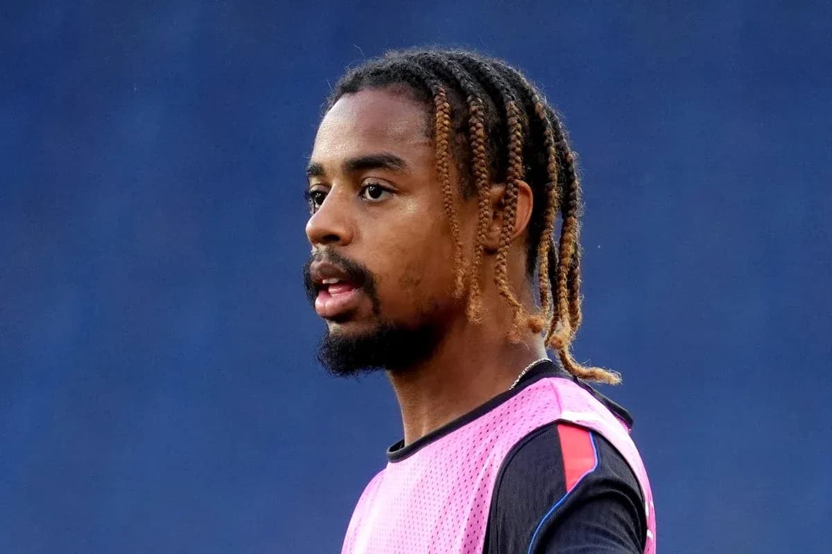 Player wearing training vest during warm-up session Player wearing training vest during warm-up session