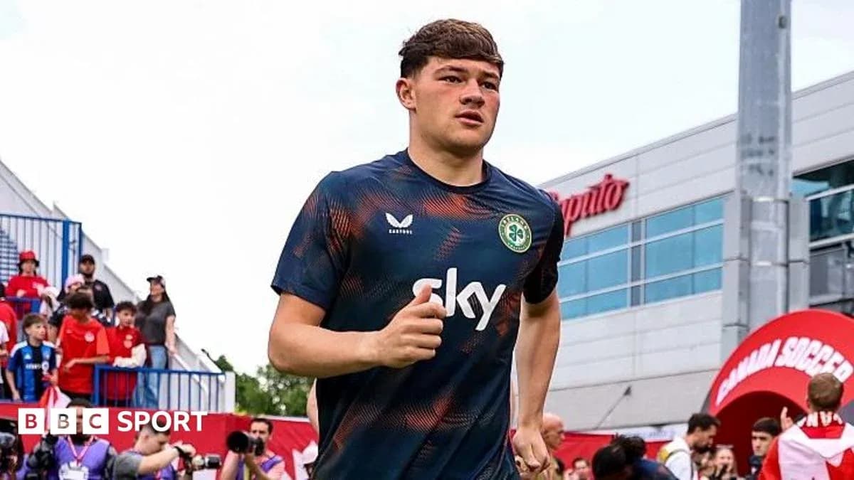 Player jogging onto the field before the match Player jogging onto the field before the match
