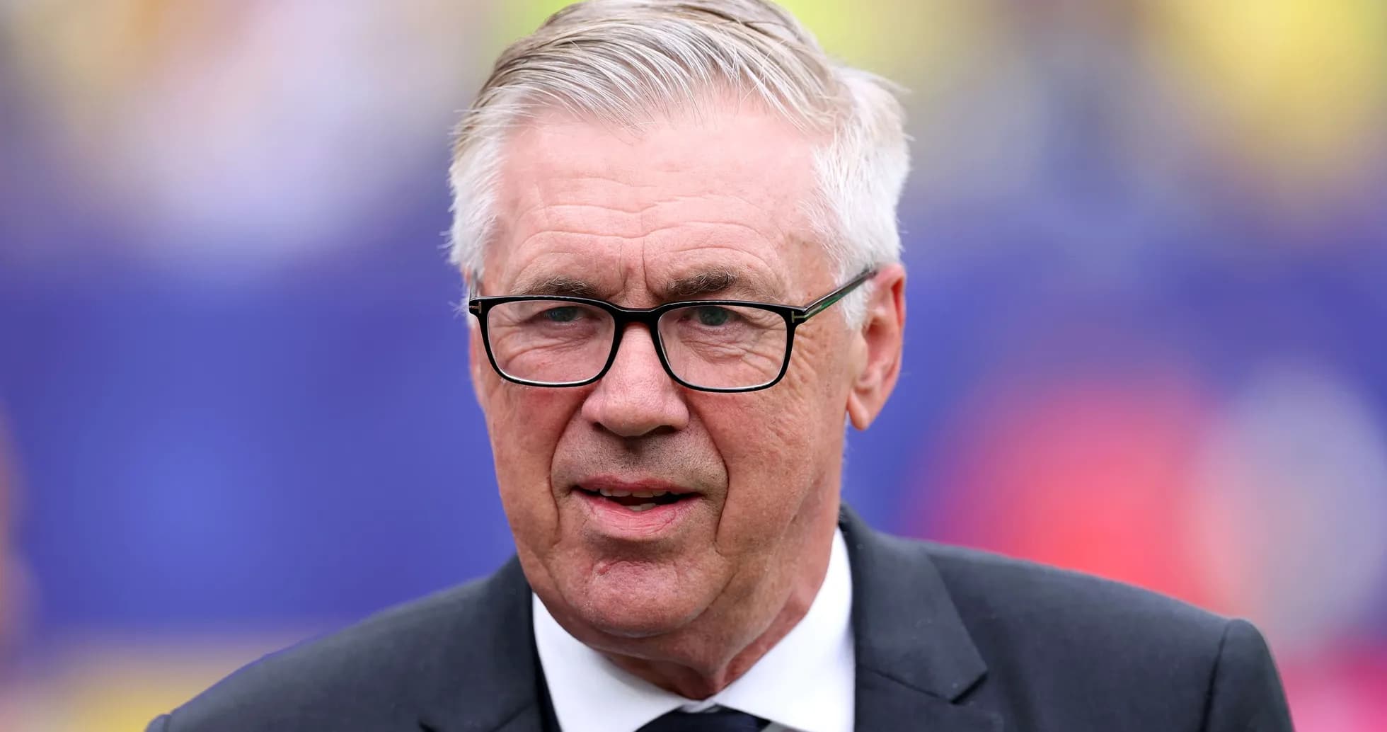 Coach with glasses at a sporting event Coach with glasses at a sporting event