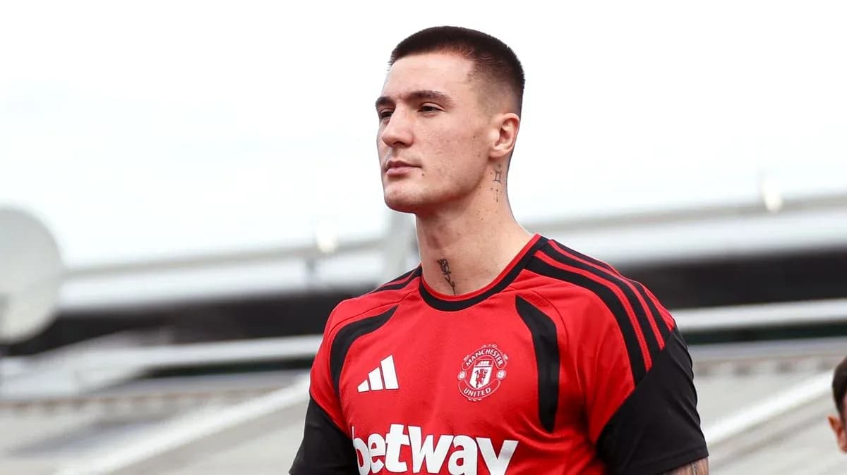 Player in Manchester United training kit walking Player in Manchester United training kit walking