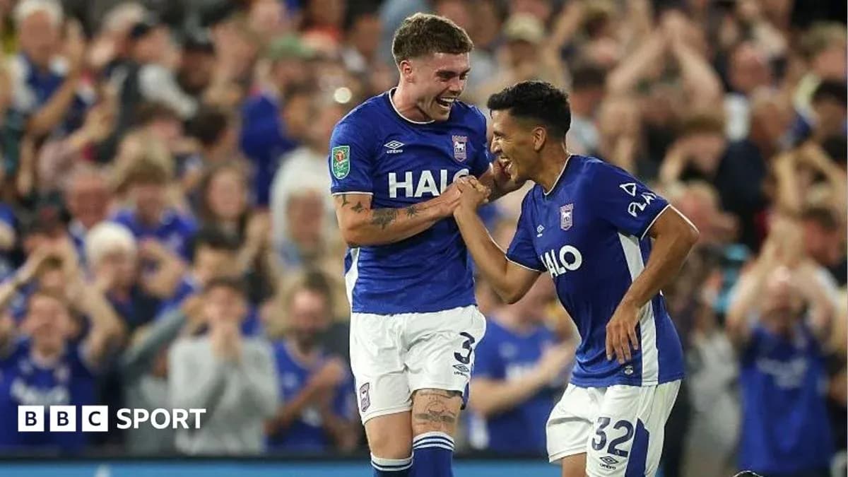 Two players celebrating a goal for Ipswich Town Two players celebrating a goal for Ipswich Town