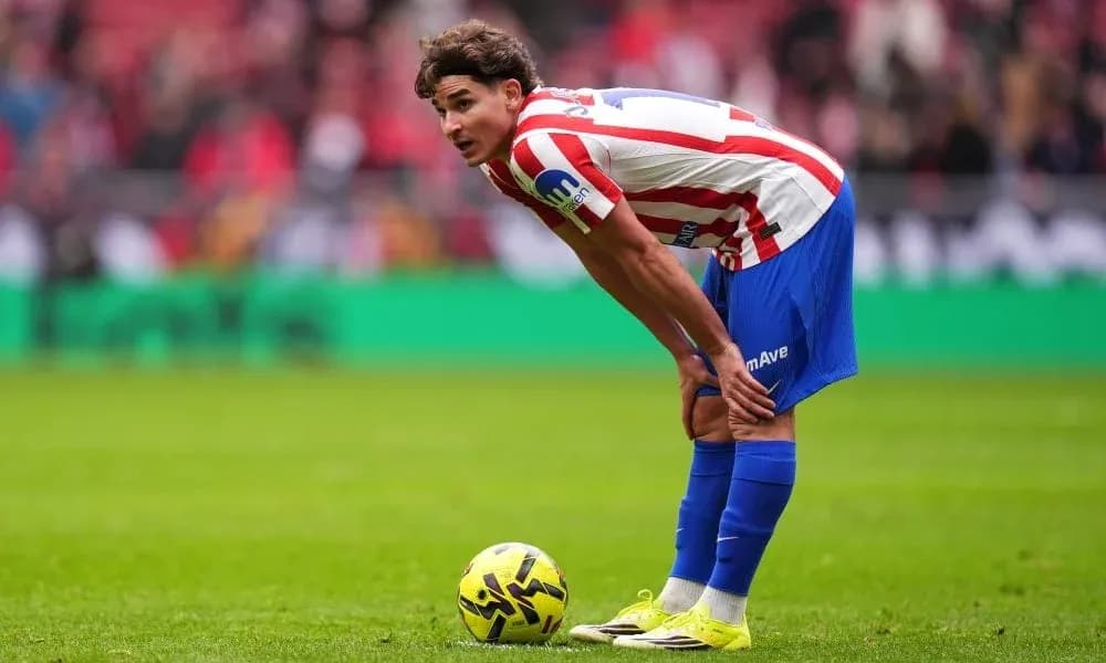 Player preparing for a free kick on the field Player preparing for a free kick on the field