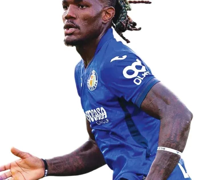 Player celebrating during a football match Player celebrating during a football match