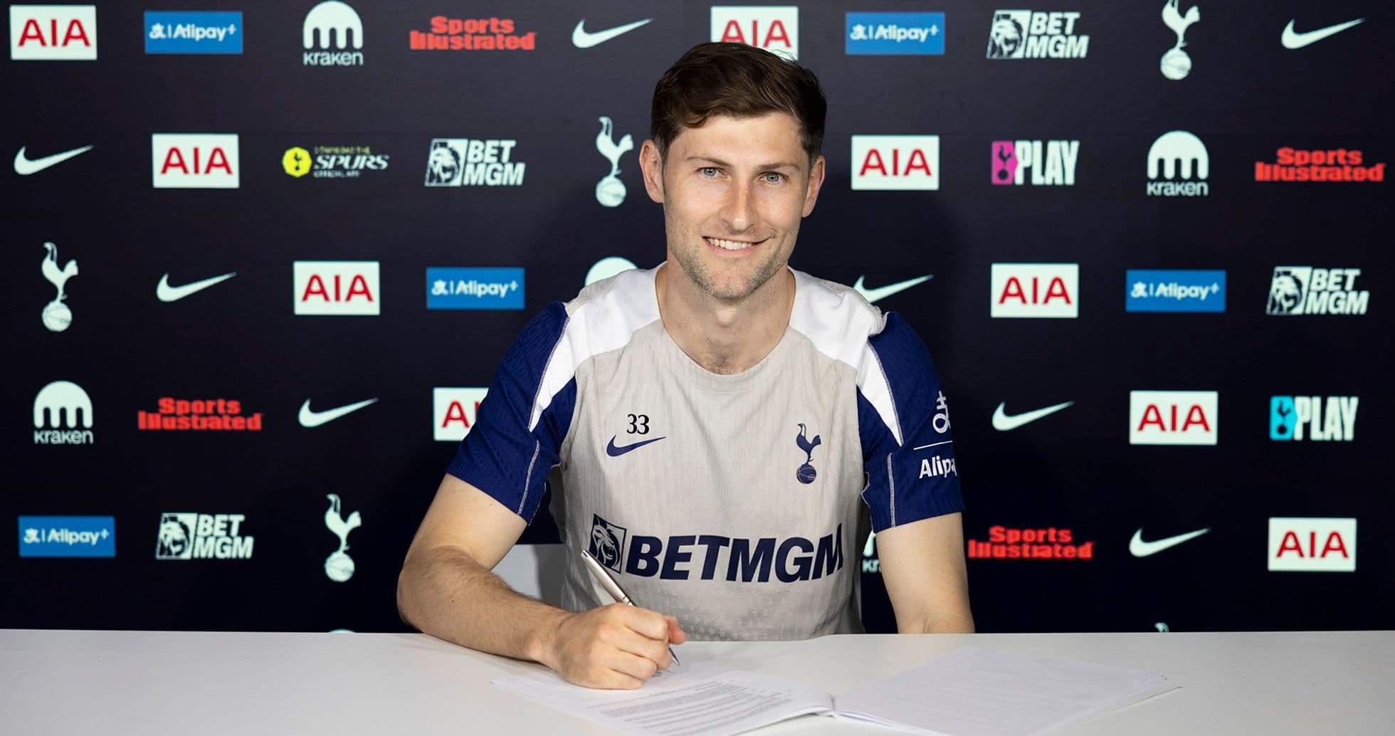 Player signing contract at Tottenham Hotspur press event Player signing contract at Tottenham Hotspur press event
