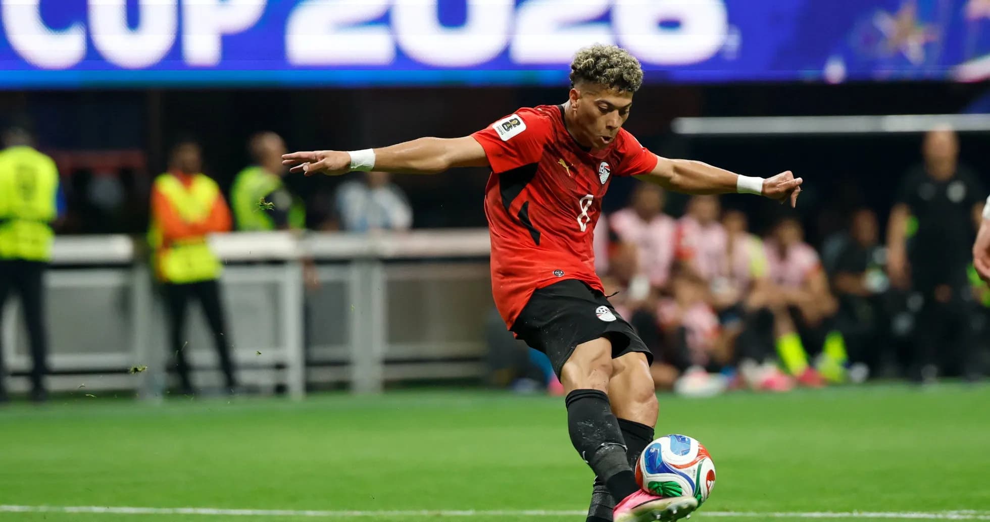 Player kicking ball during 2026 World Cup match Player kicking ball during 2026 World Cup match