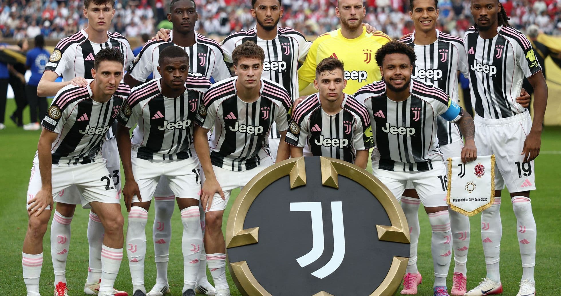 Juventus team posing with club logo before match Juventus team posing with club logo before match