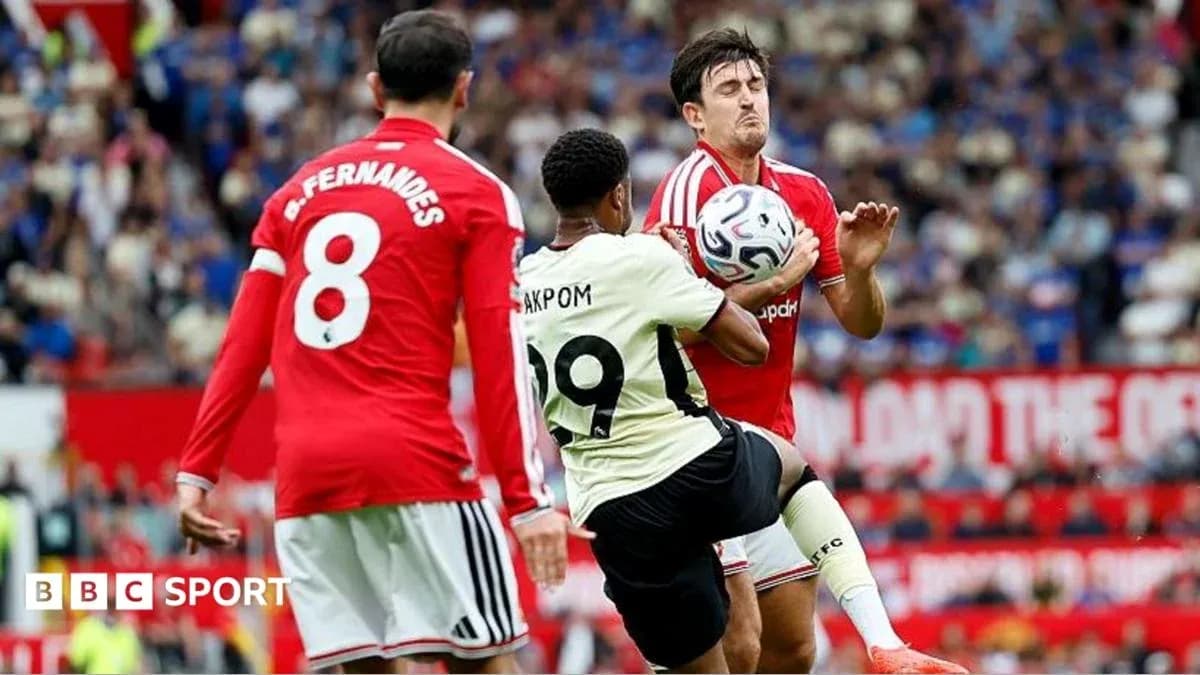 Player attempting to control ball in match action Player attempting to control ball in match action