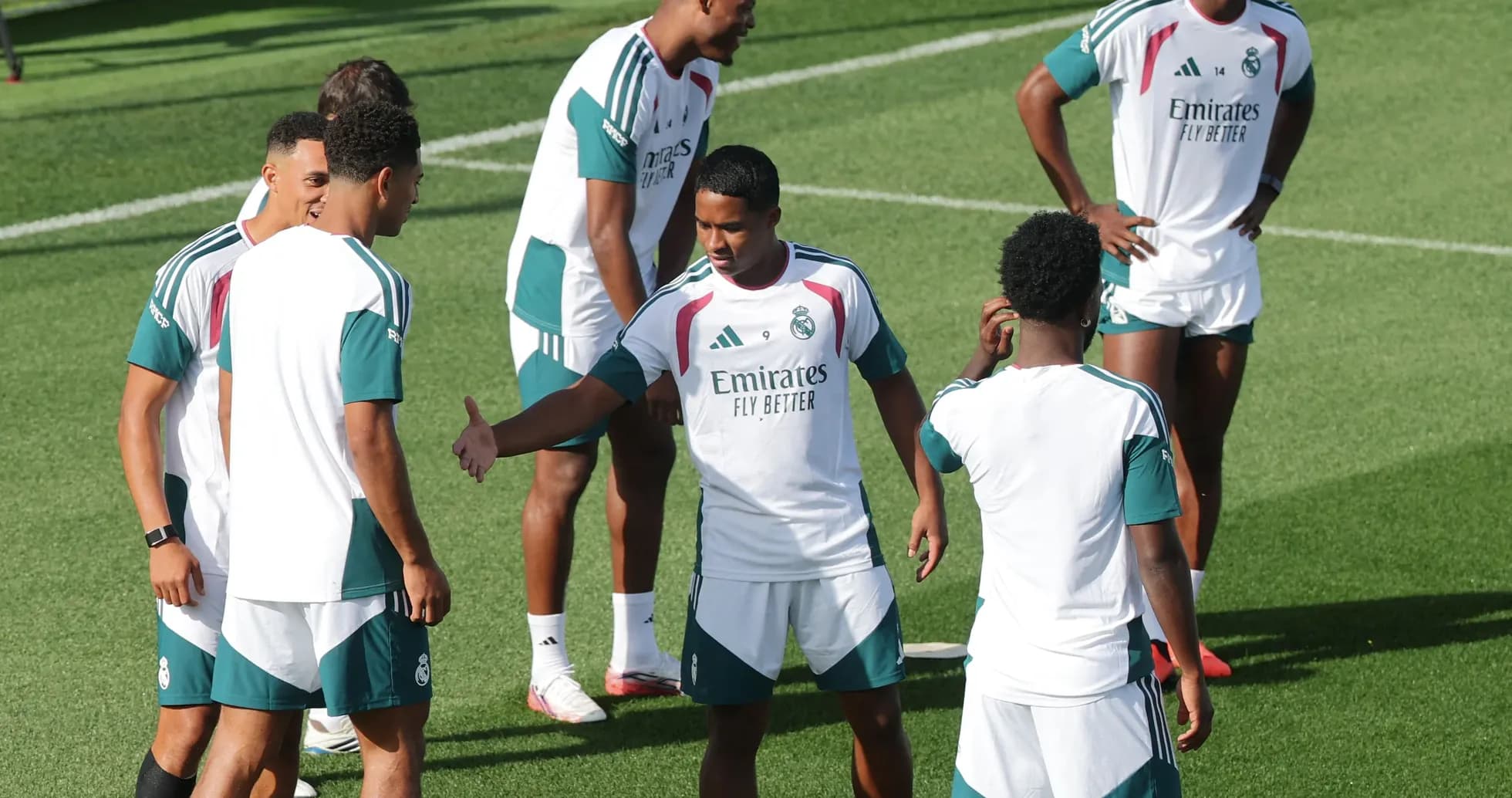 Real Madrid players interacting during training session Real Madrid players interacting during training session