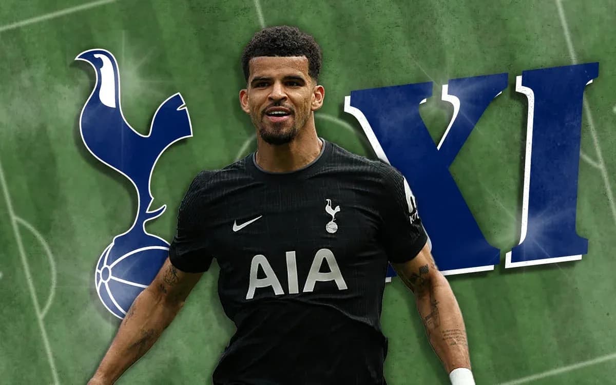 Player in Tottenham kit celebrating on pitch Player in Tottenham kit celebrating on pitch