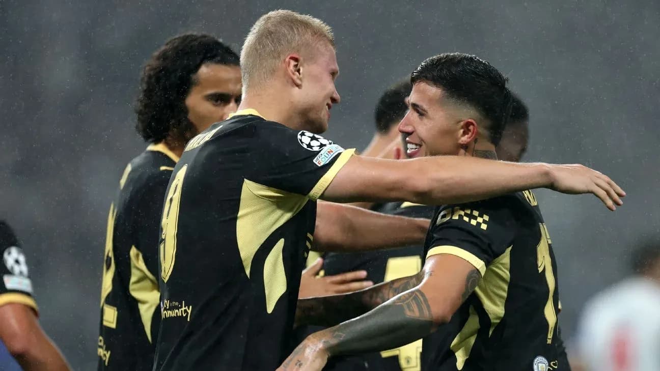 Players celebrating after scoring a goal during match Players celebrating after scoring a goal during match