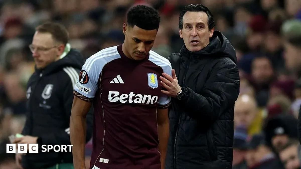 Aston Villa player talking to manager during match Aston Villa player talking to manager during match