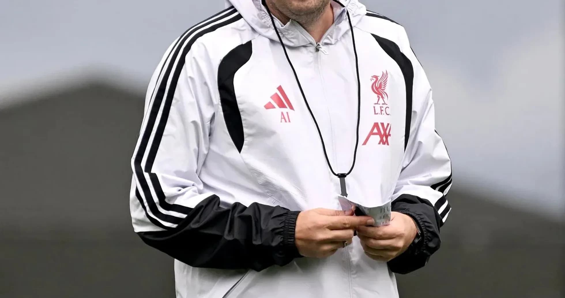 Liverpool coach smiling during training session Liverpool coach smiling during training session