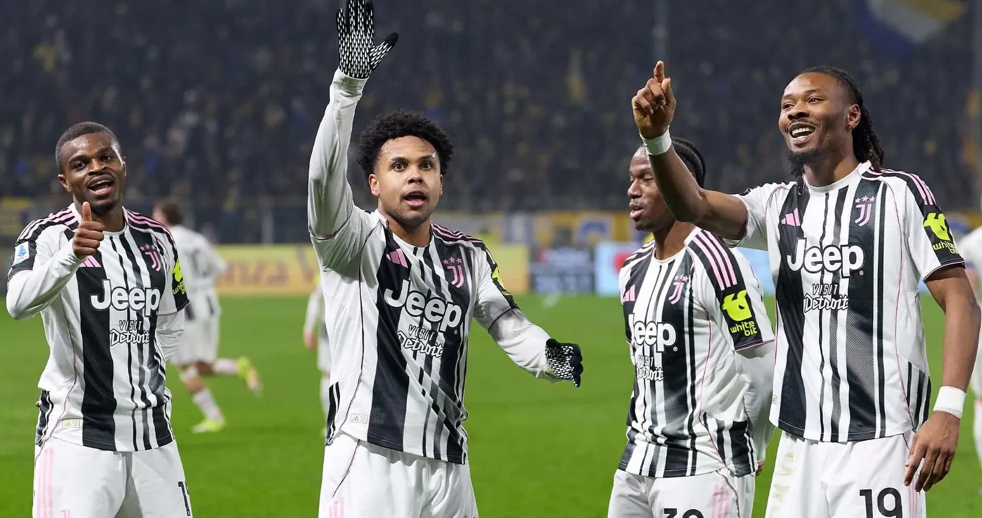 Juventus players celebrating during Serie A match Juventus players celebrating during Serie A match