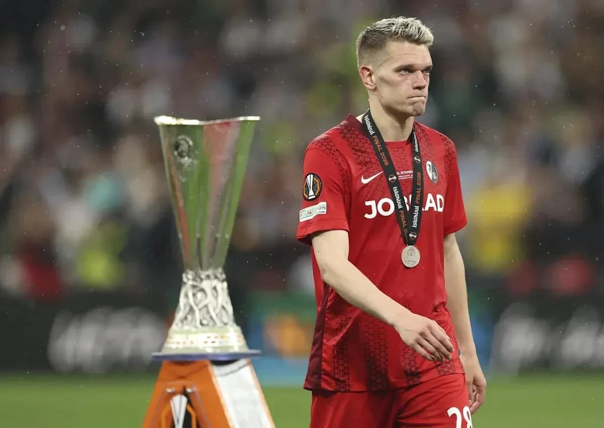 Player walking past trophy after match Player walking past trophy after match