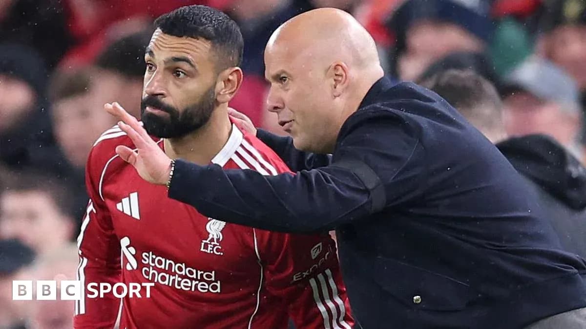 Player receiving tactical instructions from coach on sidelines Player receiving tactical instructions from coach on sidelines