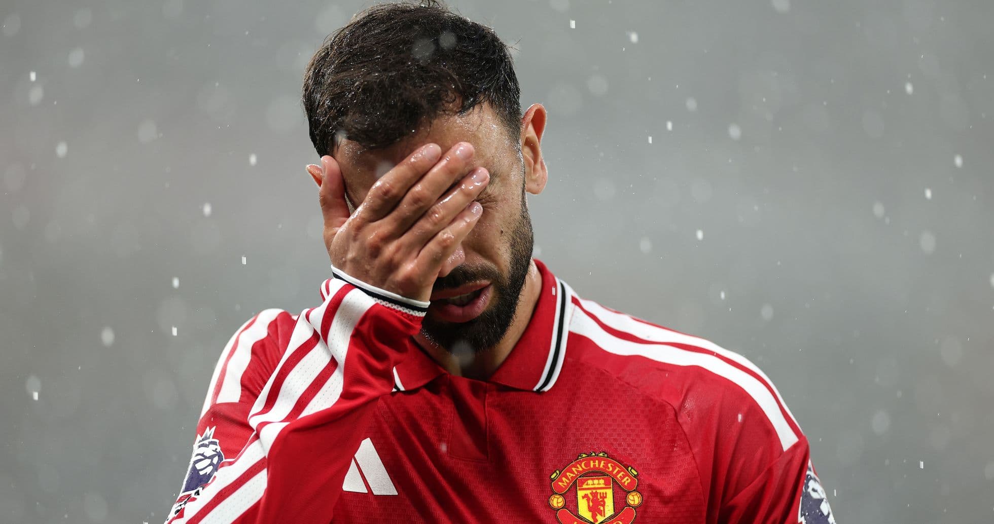 Player covering face with hand during match Player covering face with hand during match