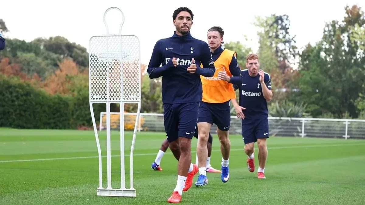 Tottenham players running during training session Tottenham players running during training session