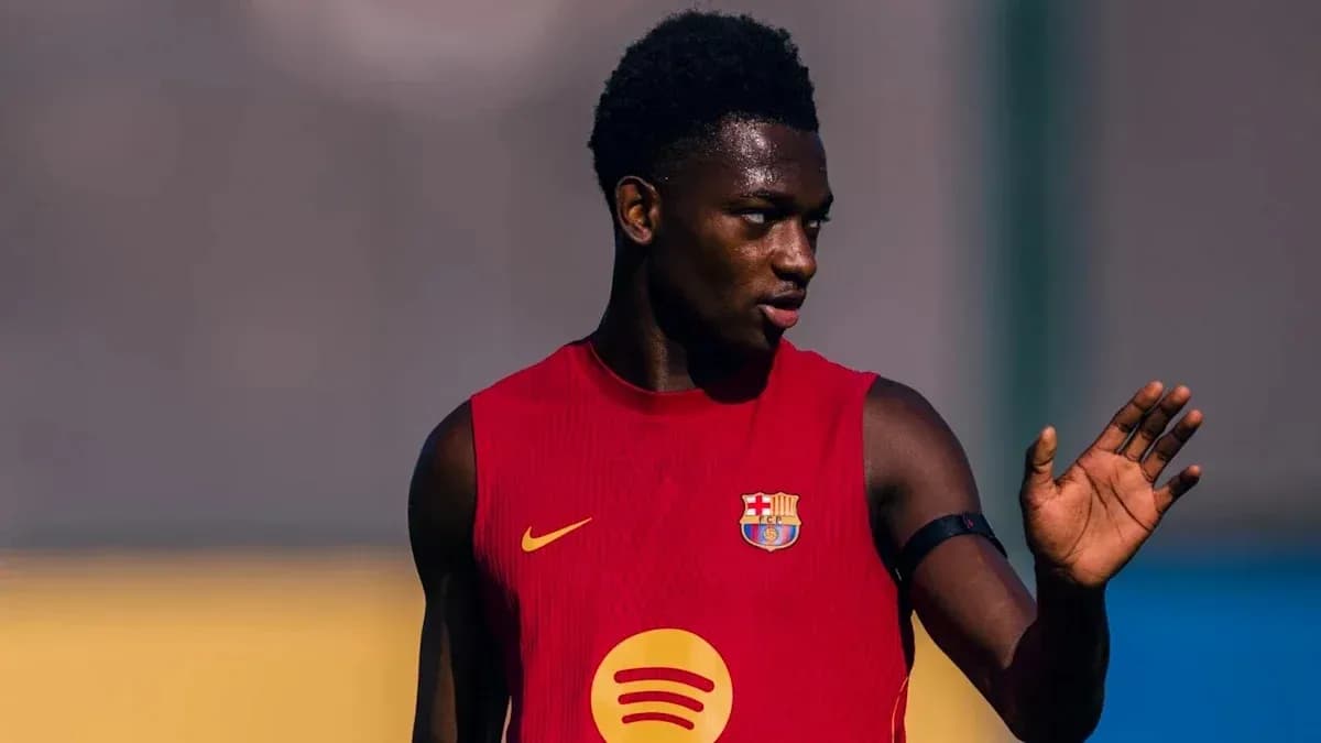 Player in training jersey gesturing on the field Player in training jersey gesturing on the field