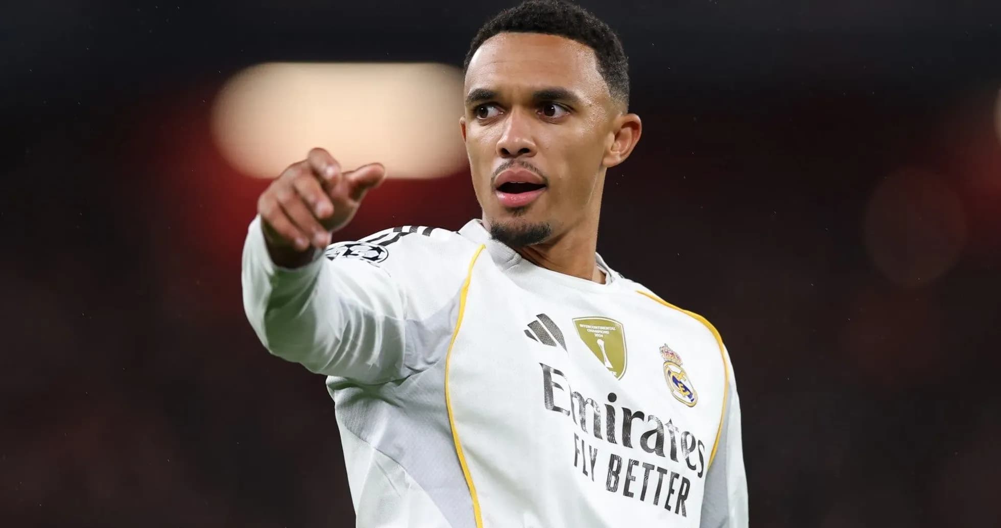 Player pointing during a football match Player pointing during a football match