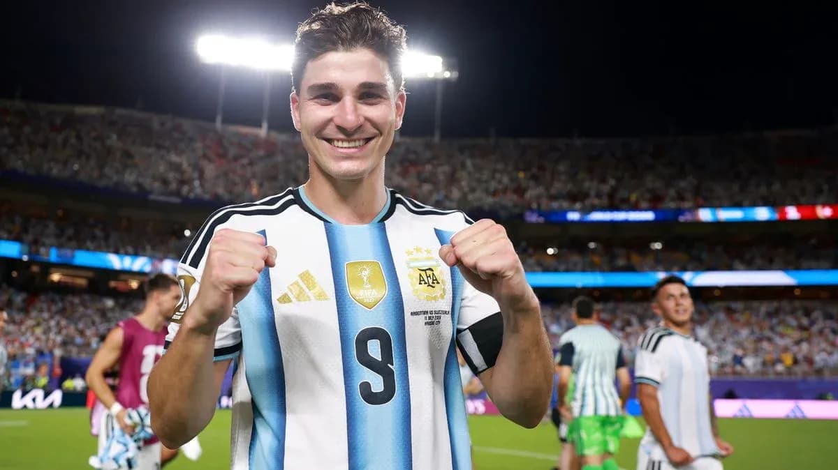 Player celebrating victory in Argentina jersey Player celebrating victory in Argentina jersey