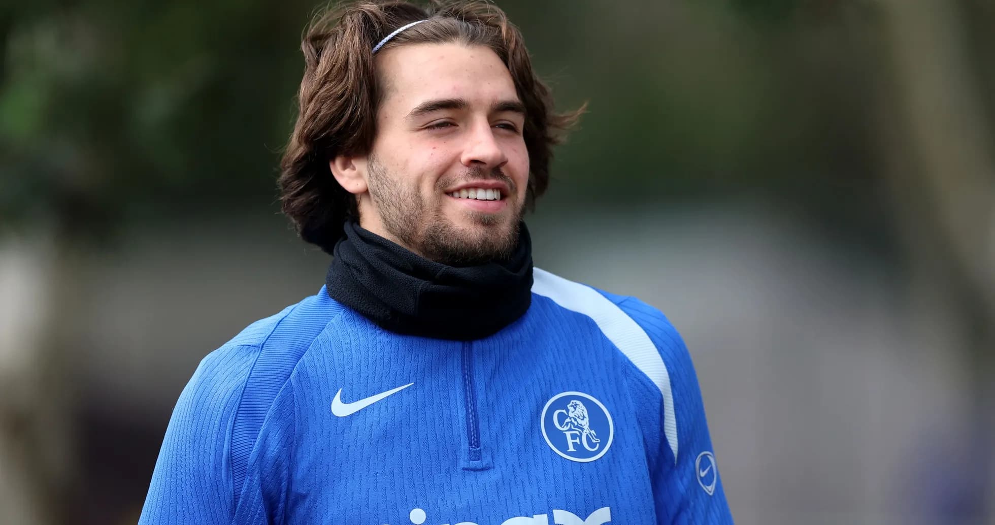 Player smiling during training session in blue jersey Player smiling during training session in blue jersey