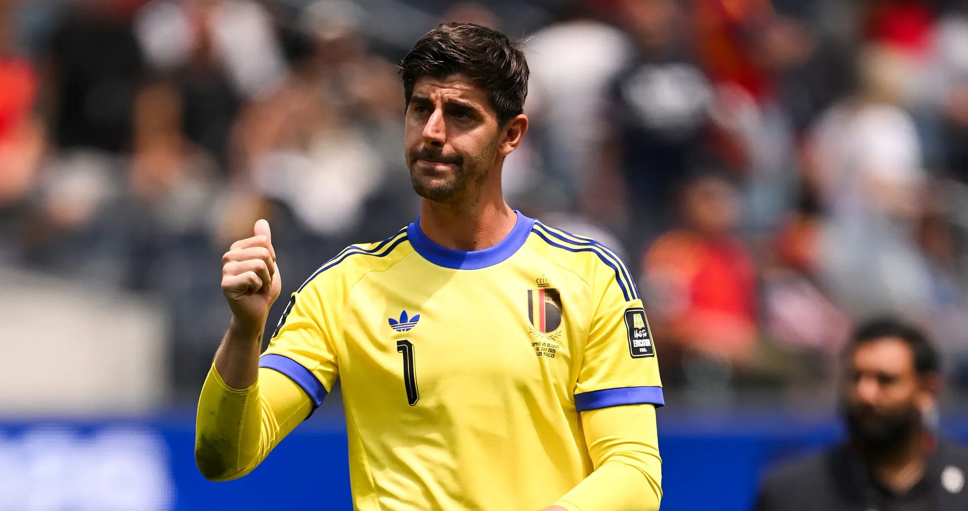Goalkeeper in yellow jersey giving thumbs up Goalkeeper in yellow jersey giving thumbs up