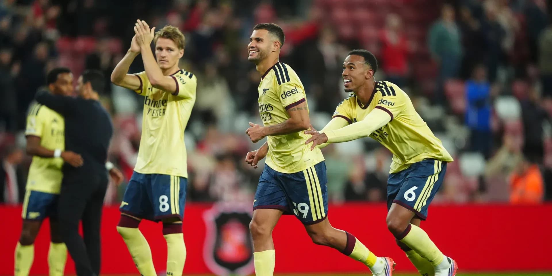 Players celebrating a goal during a match Players celebrating a goal during a match