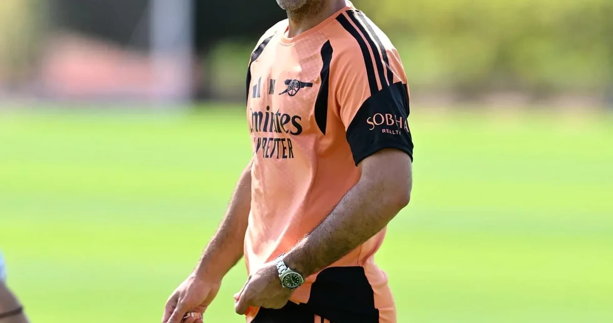 Arsenal manager smiling during training session Arsenal manager smiling during training session