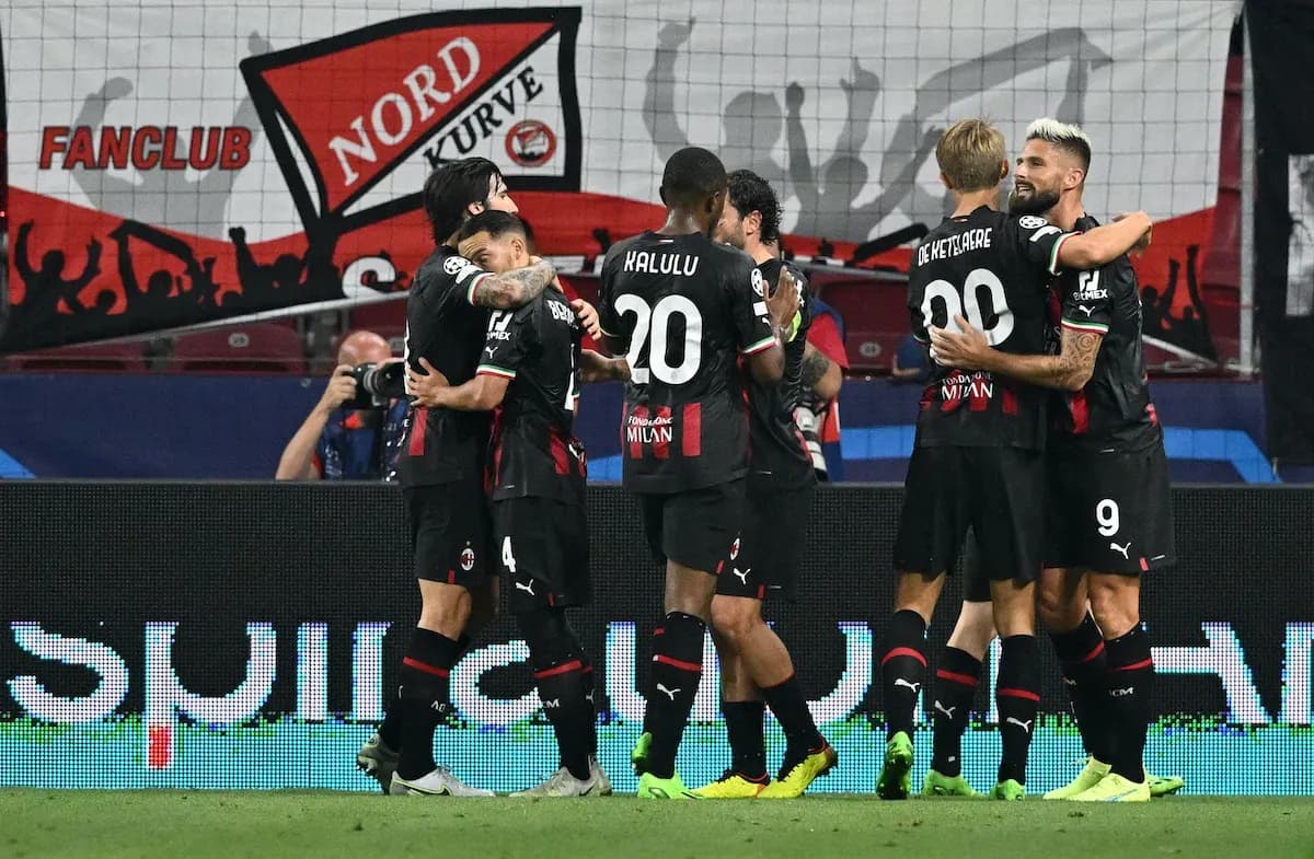 AC Milan players celebrating a goal AC Milan players celebrating a goal
