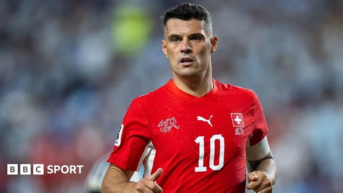Granit Xhaka wearing Switzerland jersey during match Granit Xhaka wearing Switzerland jersey during match